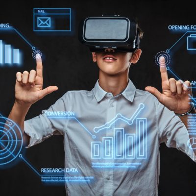 teenager-dressed-white-t-shirt-using-virtual-reality-glasses-with-graph-charts-numbers-lines-technology-concept